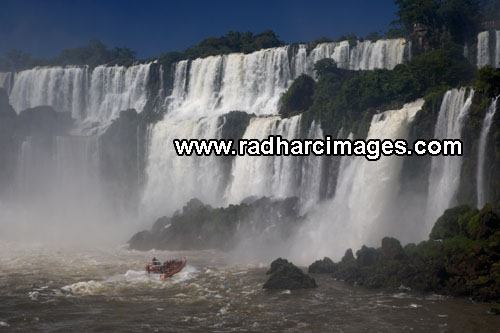 Boat under Iguazu Falls
