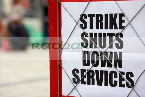 strike shuts down services newspaper headline