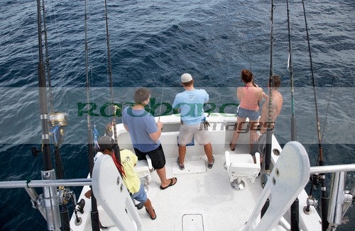 tourists on a charter fishing boat in the gulf of mexico out of key west florida usa