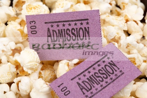 cinema entrance tickets and popcorn